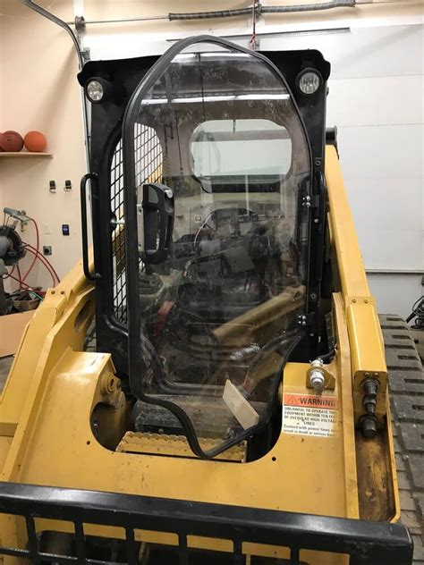 caterpillar skid steer front door|caterpillar skid steer door glass.